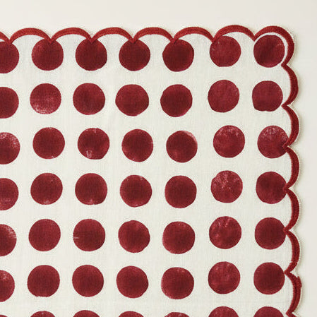 maroon polka dots with scalloped edges in hand block printed.
